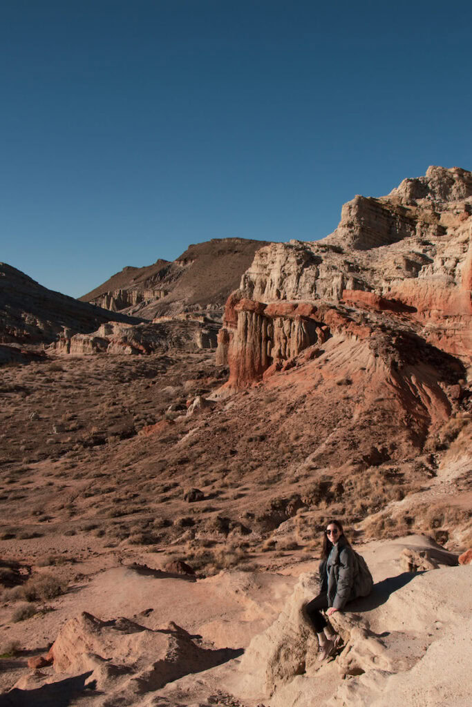 Women in front of desert cliffs at Hagen Canyon in Red Rock Canyon State Park