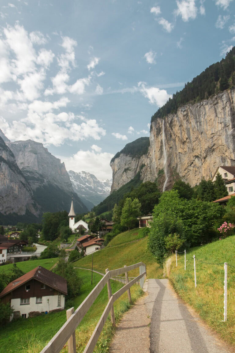 View of Staubbach Falls and chapel in Lauterbrunnen