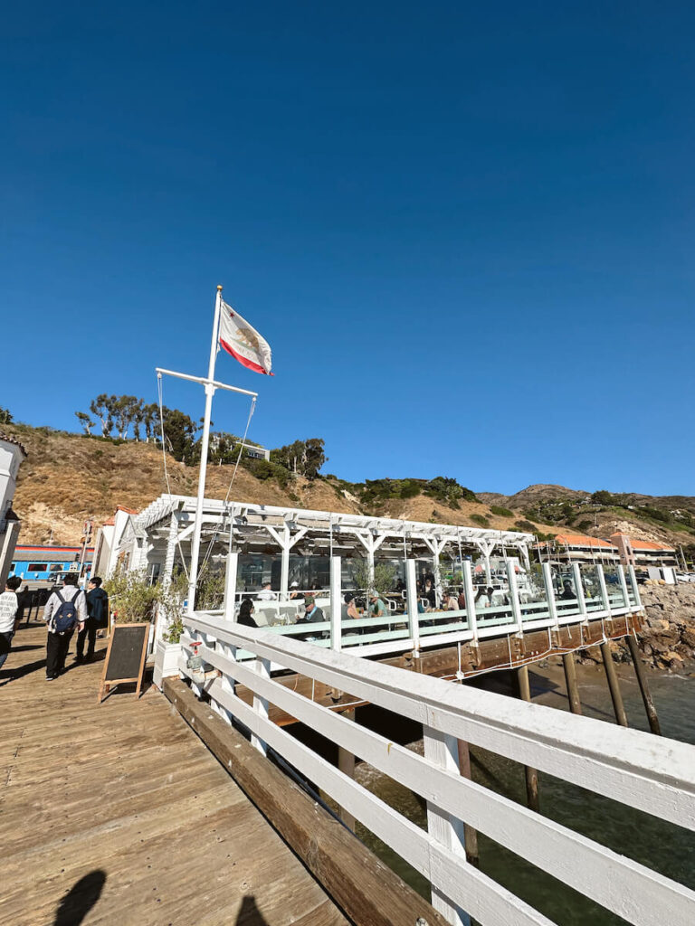 The exterior of Malibu Farm restaurant at the base of the Malibu Pier, with