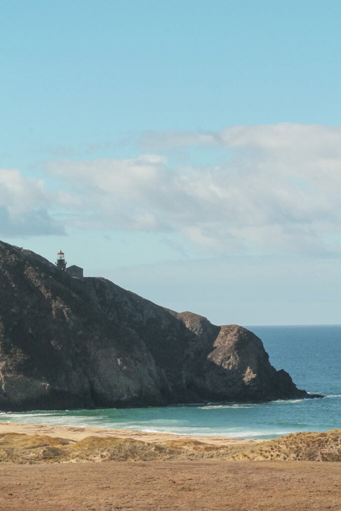 Point Sur Lighthouse on top of a coastal cliff