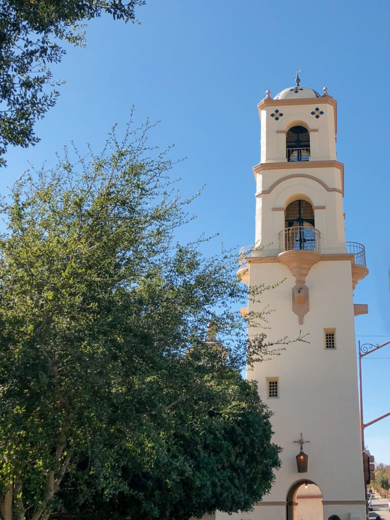 The Ojai Post Office Tower next to a tree