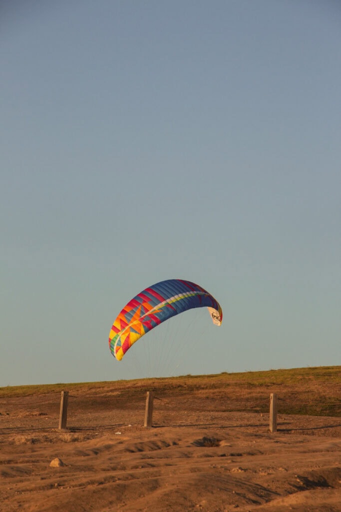 A paraglider taking off from the gliderport in Torrey Pines