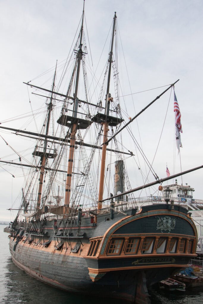 A historic ship docked in the San Diego Harbor