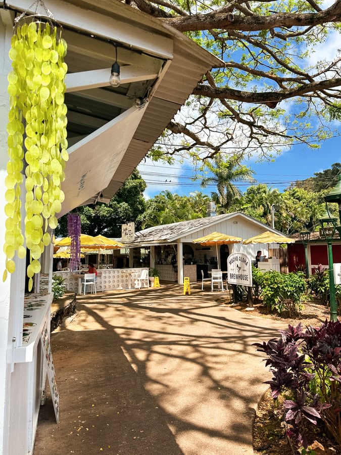 An open courtyard surrounded by different shops and eateries