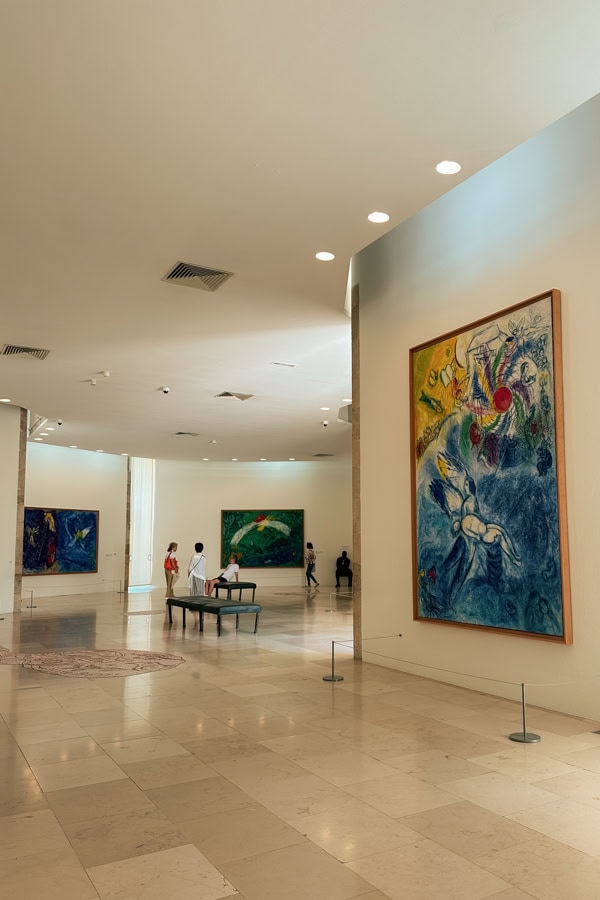 Large-scale Chagall paintings hanging on white walls at the Chagall Museum