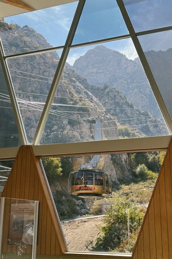 A view through a window of a tramcar descending to the Palm Springs Aerial Tramway station