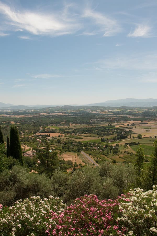 The view of the rural Provencal scenery below Gordes from a viewpoint in town